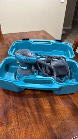 Makita 5” orbital sander used 2 times like new $60