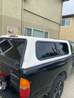 1994—2004 or nissan 1(contact info removed) or S-10 Camper shell  still good shape $450 or  OBO