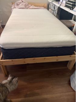 Twin Wooden bed frame with mattress and topper