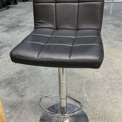 Black adjustable barstool