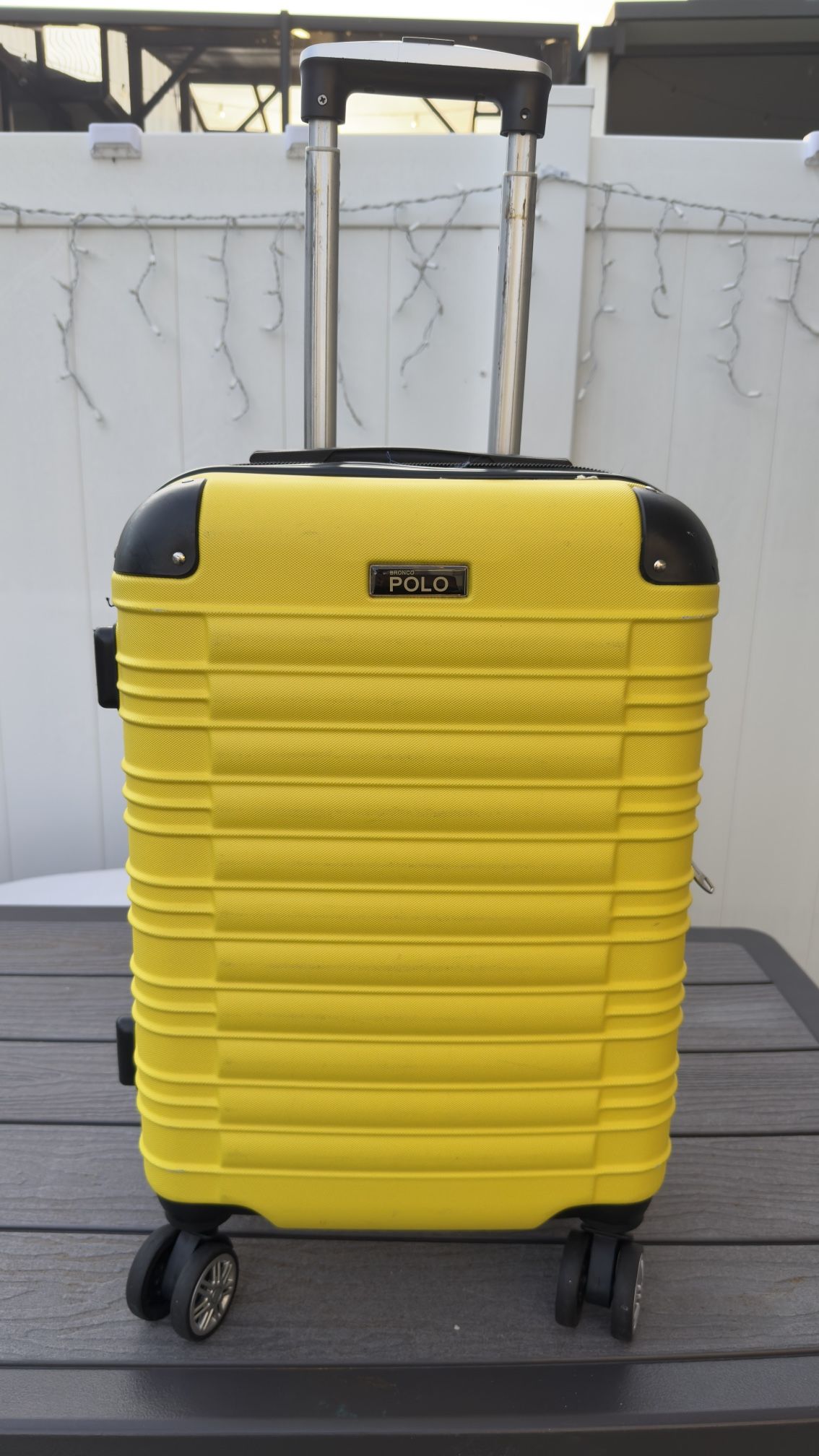 Selling carry-on suitcase, 22.5x13x8.5 inches.