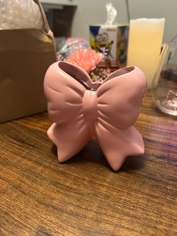 Pink ceramic bow vase