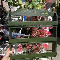 Green wooden wall mounted rack for spices, perfume bottles etc