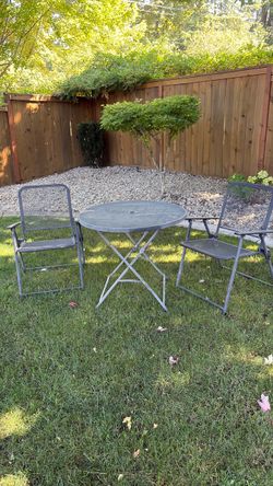 Small outdoor table with chairs