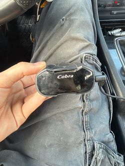 This radar detector is the Cobra ESD-6100. It detects X, K, Ka, and laser bands and is part of Cobra