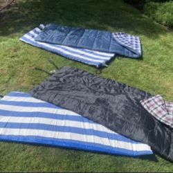 2 camping sleeping bags with pads