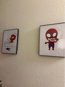 Spider-Man framed bathroom pictures