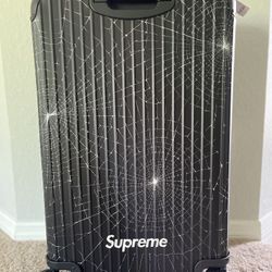 Supreme X Rimowa