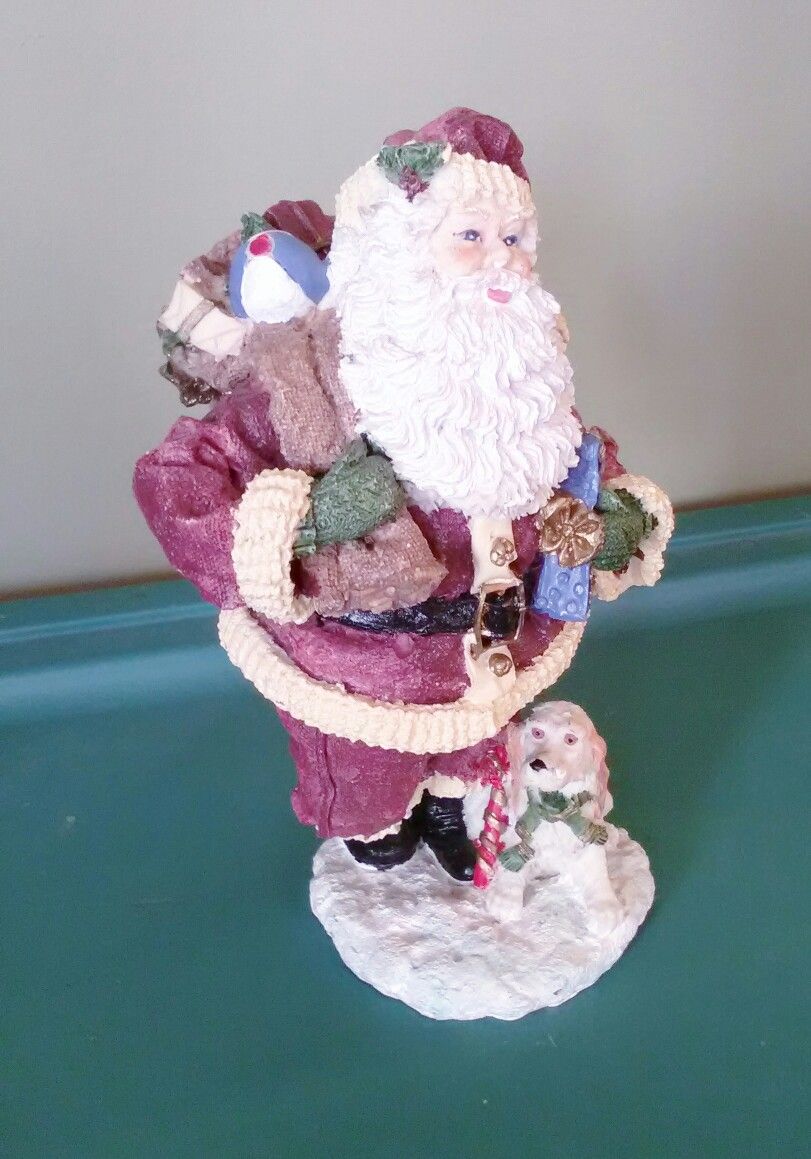 Santa Figures - two for 10 NIB