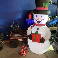 Christmas 6.5 foot LED Snowman indoor or outdoor air blown inflatable, ground stakes and tethers  Also have Santa Claus