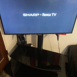 43” Sharp Roku Tv And Tv Stand 