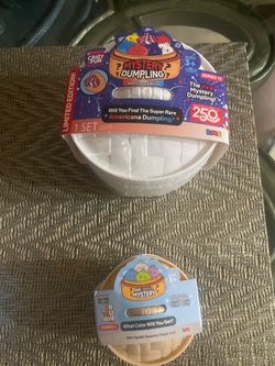 Mystery vile dumplings, a large one and a mini one