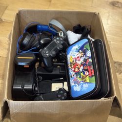 Box Lot of Gaming Accessories – Controllers, Headsets, Cables, Wheel & More