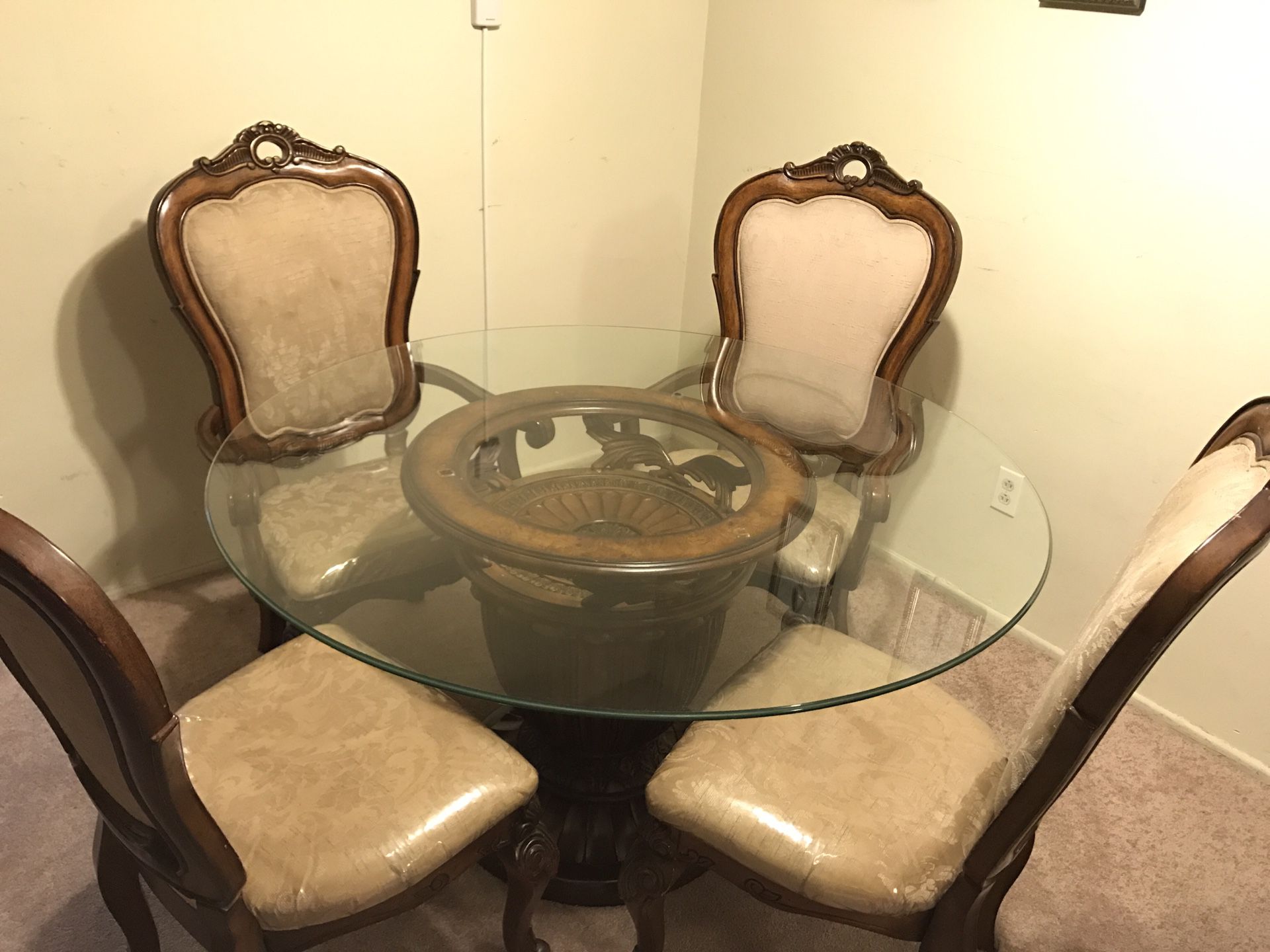Solid wood dining table base with glass top