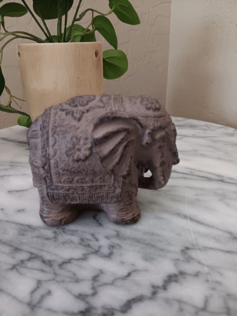 $5 Elephant Figurine Statue Good Luck Indoor/Outdoor Faux Stone.
3 1/2"x 4"