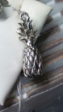 .925 pineapple charm.