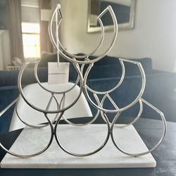$40 Anthropologie Wine rack featuring a white marble base.