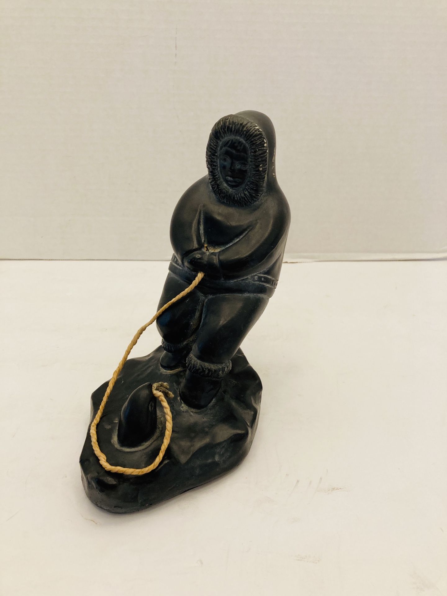 Large Vintage Inuit Eskimo Pulling a Seal Out Of The Ice with Rope Soapstone Statue Made by Abbott Canada