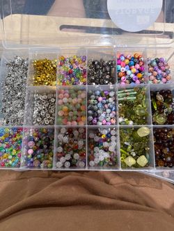 Assorted beads and storage box