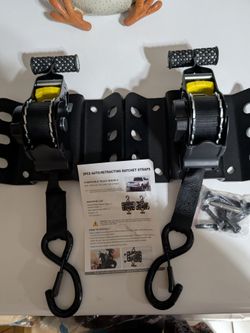 Auto retracting straps