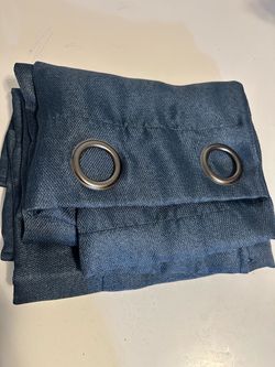 Two dark blue curtains