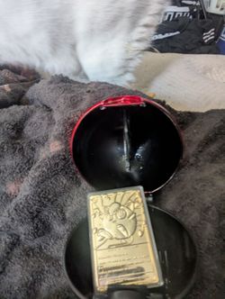 Gold Pokémon card and Pokémon Ball