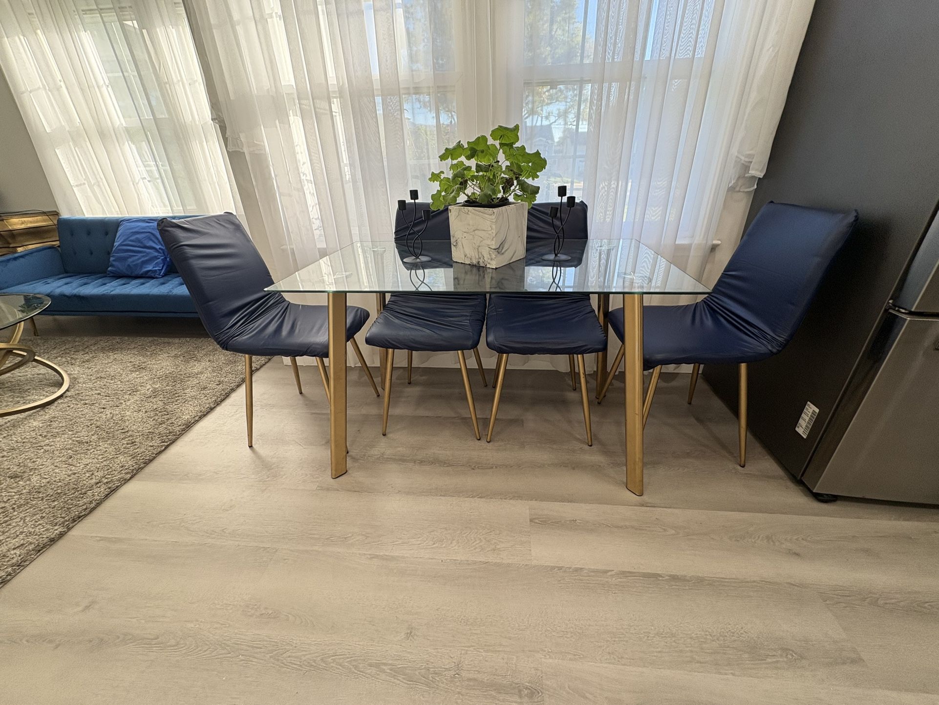 Dining Table With Glass Top And Gold  Metal Legs