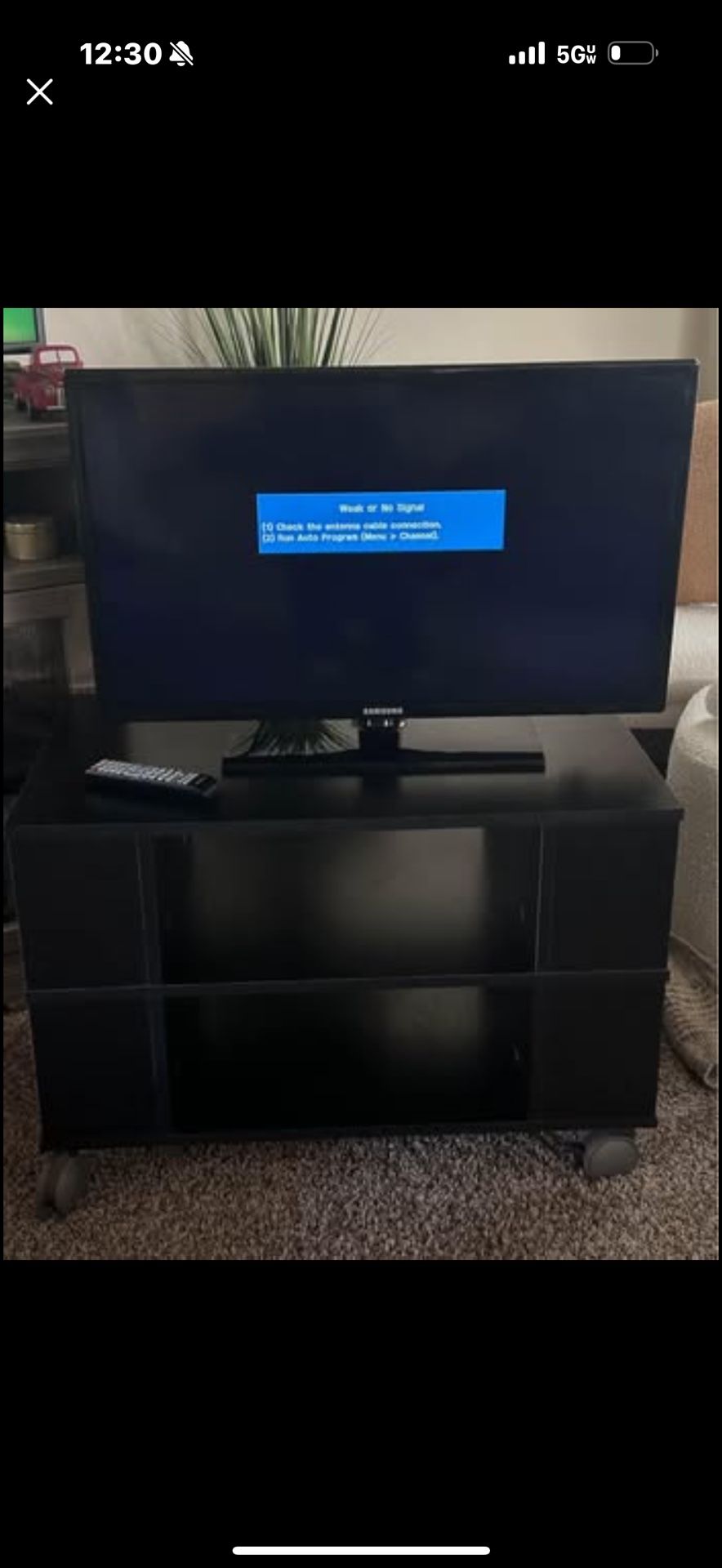 Samsung 26 inch LED with remote, series 4000, see pich tires for model and connections on back, Cabinet on wheels - locking wheels- with shelves in mi