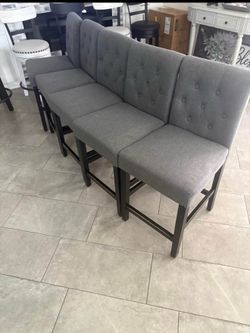 6 gray barstool chairs