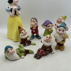 Vintage Walt Disney Snow White and the Seven Dwarfs Figurines • Ceramic • Japan. Snow White is approximately 6”, and the doors are approximately 3”. V