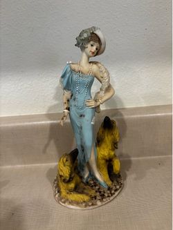 Tall art deco woman with 2 afgans