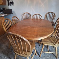 Solid Oak TABLE WITH 8 SOLID CHAIRS WITH 1 LEAF