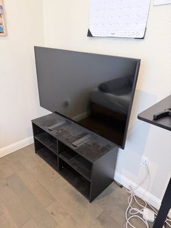 Samsung TV and dresser combo