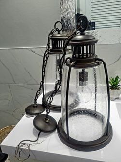 Pendant lights with seeded glass approximately 19" tall , in Very Nice Conditions for indoor or outdoor use , Set Of 3  $90