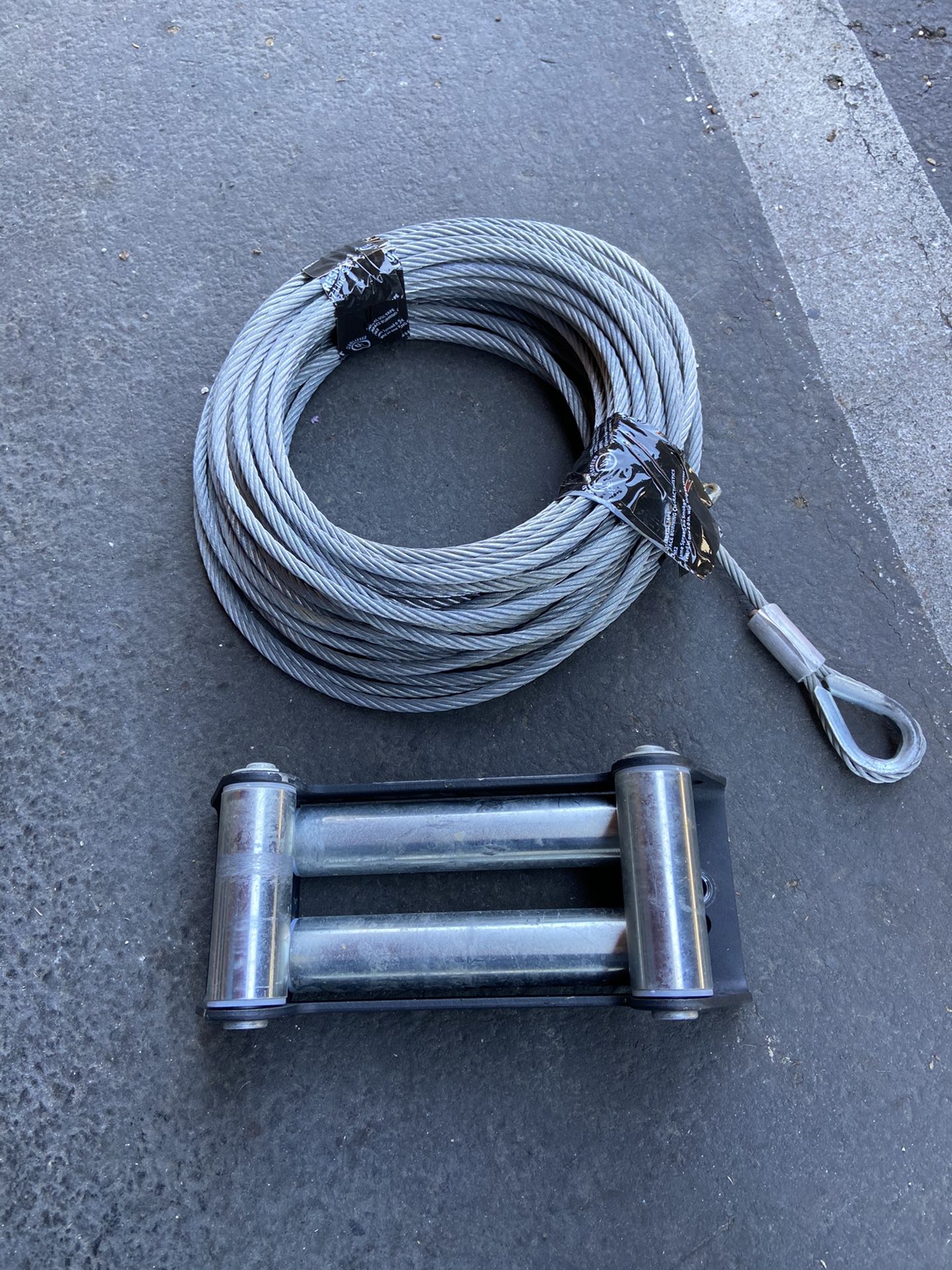Winch cable and roller fairlead