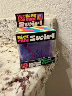 Authentic NeeDoh purple swirled Cube.  Brand new!