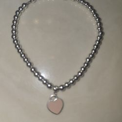 TIFFANY & CO. STERLING SILVER PINK ENAMEL HEART BRACELET 