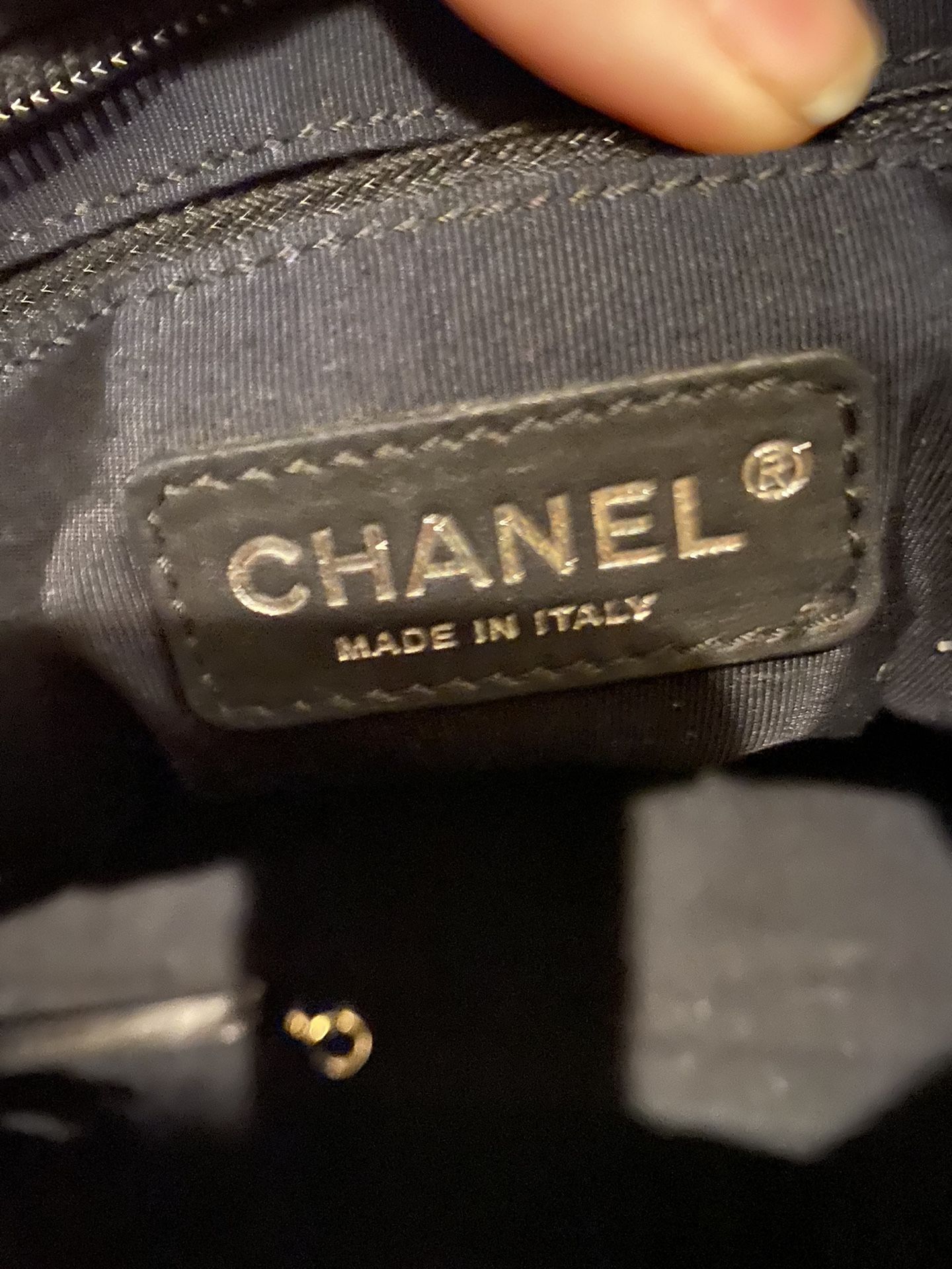 authentic Chanel bag , medium size very roomy. Black,on black  