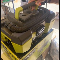 RYOBI VACUUM NEW IN BOX & BATTERY