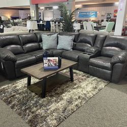 Brand New Sectional With 2 Reclining Seats. By Ashley
