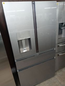 GE Cafe stainless steel four-door french door refrigerator with glass front - Free delivery
