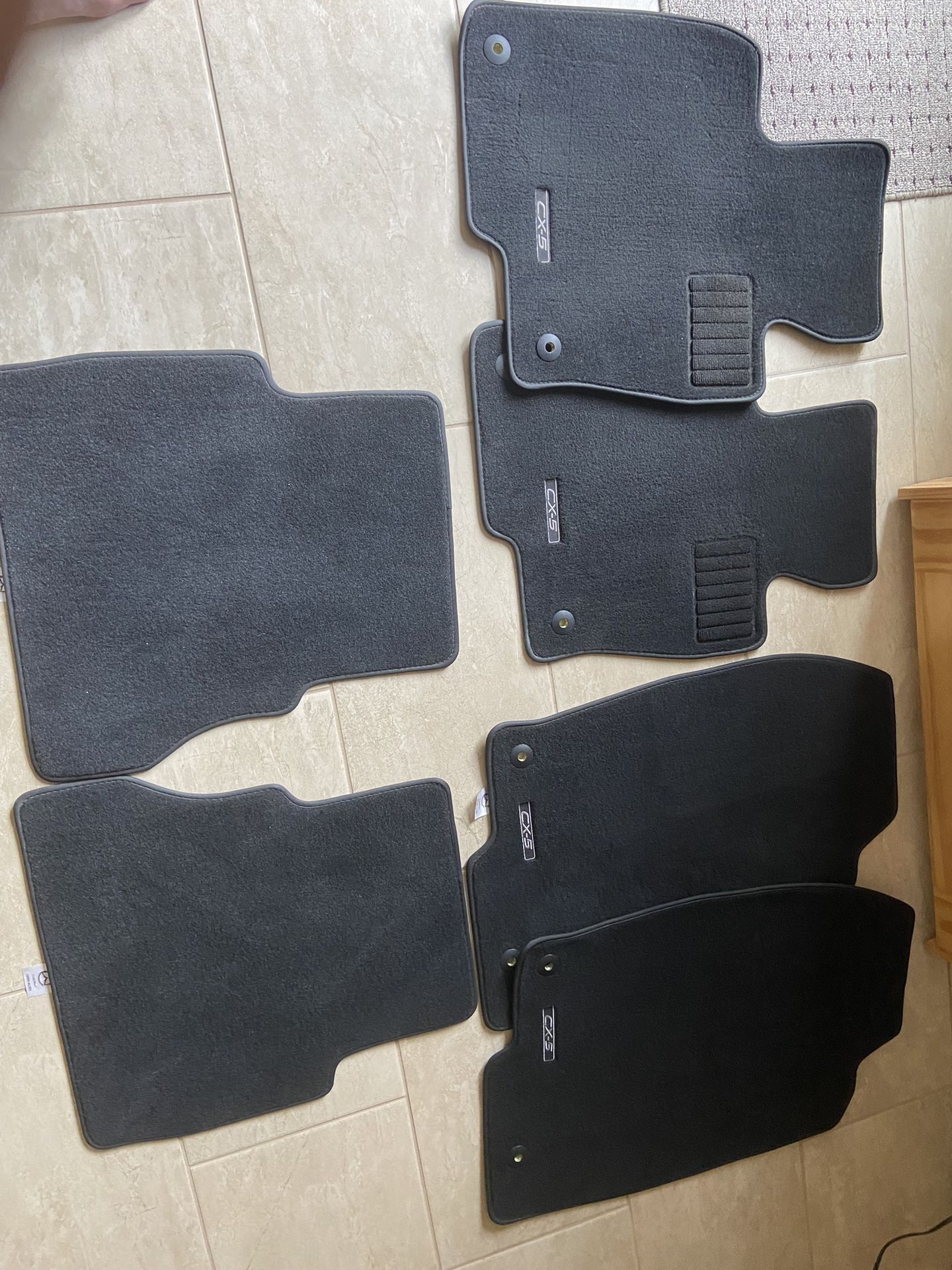 Mazda CX-5 Car Mats. One Set New, One Set Slightly Used.