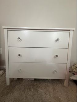 Pretty white dresser with bling knobs