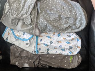 4 baby swaddlers--- 3 size large and 1 small