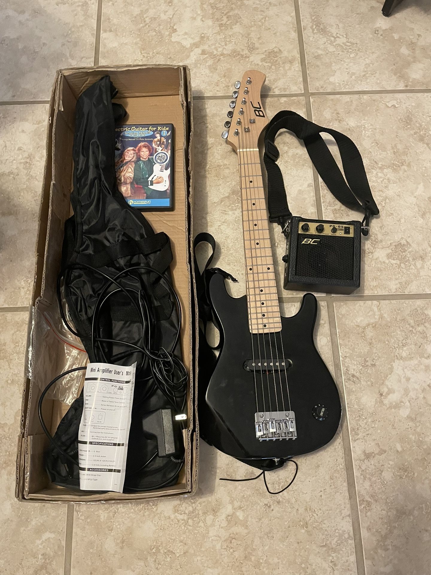 Best Choice Kids Electric Guitar with amp, case, cord, strap.