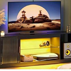 Fluted TV Stand for 65 Inch TV, Gaming LED Entertainment Center with Cabinet for PS5 Xbox, High Gloss TV Console for Living Room, Adjustable Glass She