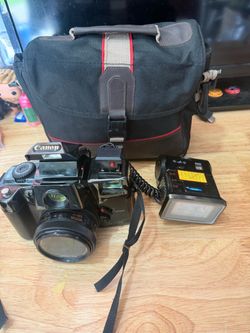 Canon Q8200 Camera Film Motor Drive Flash Bag Strap paperwork 35 mm Photography Capture every moment with the Canon Q8200 Camera Film Motor Drive, a