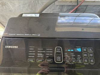 WASHER IN EXCELLENT RUNNING CONDITION . TOP OF THE LINE BLACK LAQUOR SAMSUNG GIGANIC WASHER. WILL WASHES KING SIZE COMFORTER MABY 2 OF THEM. HAS ALL T