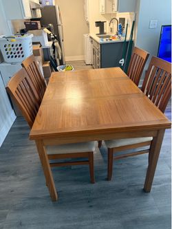 Teakwood dining room table w/4 chairs