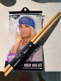 80s wig and drumsticks